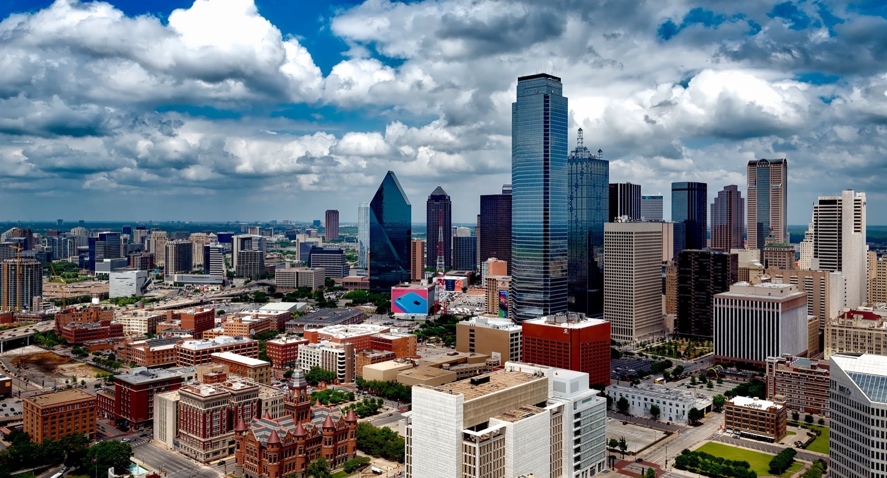 Dallas skyline under a bright Texas sky