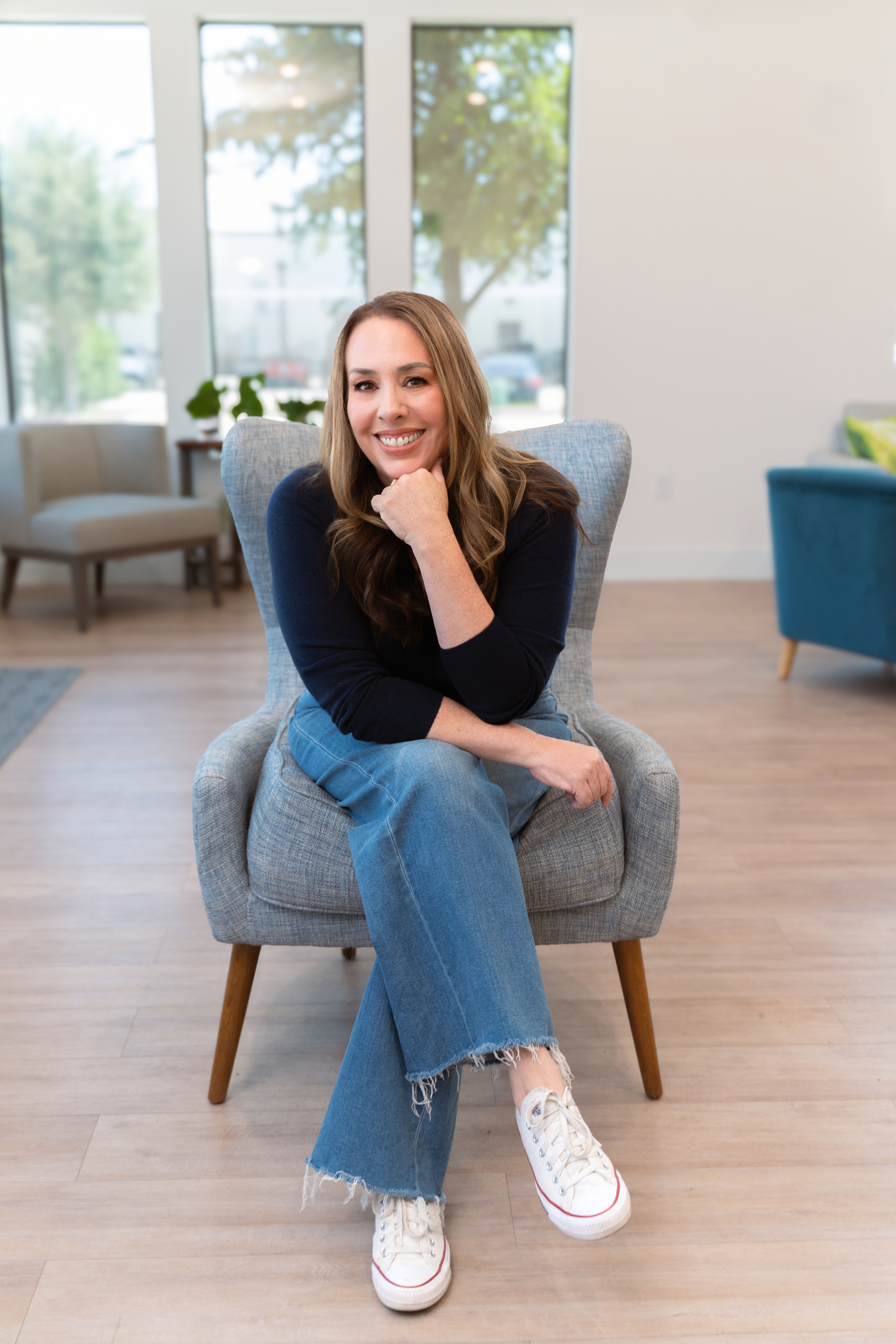 Dr. Heather Bartos seated in her practice