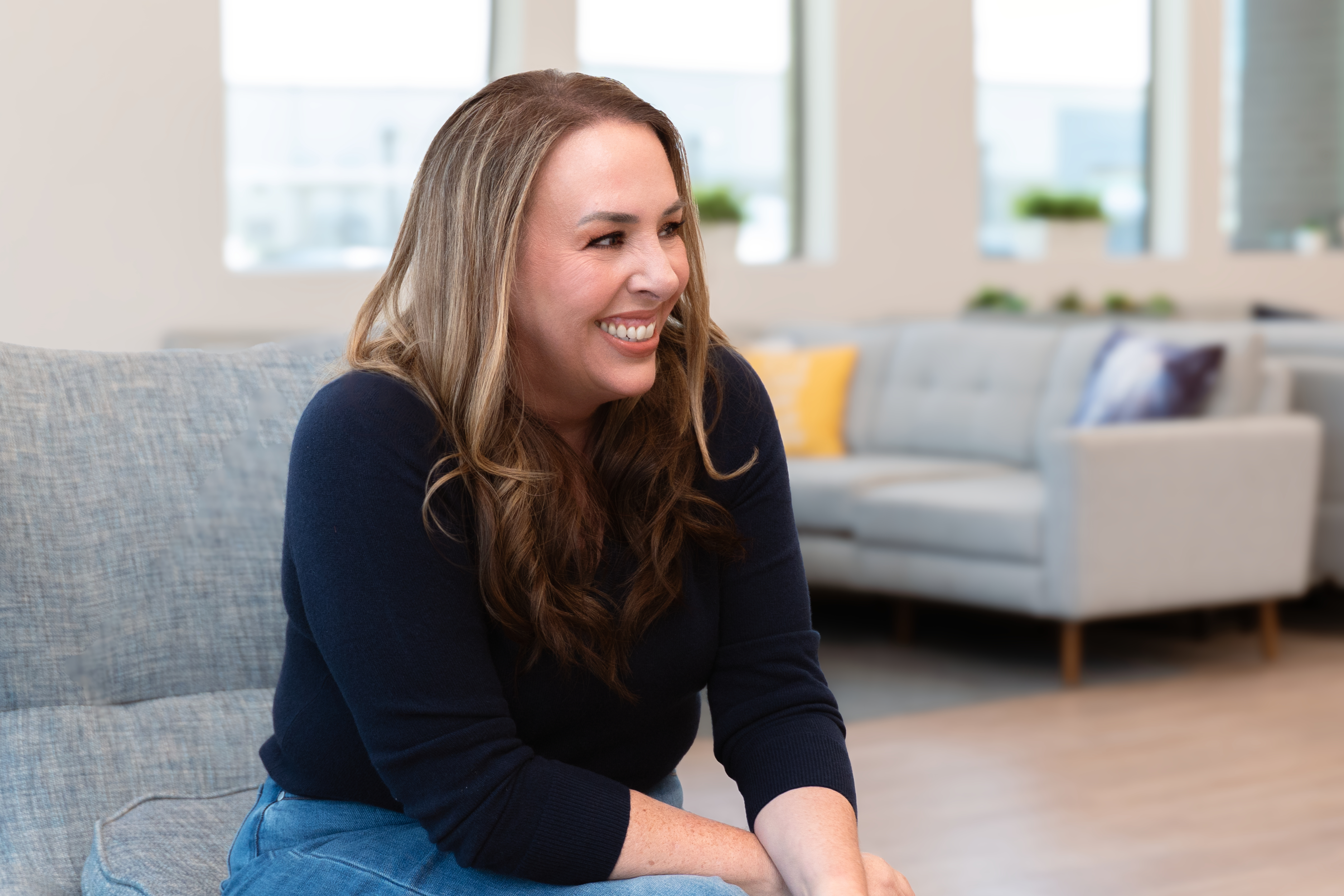 Dr. Heather Bartos smiling in her practice